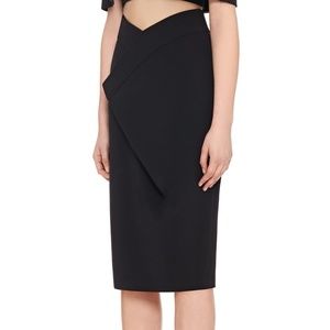AQ/AQ DELVE KNEE LENGTH WRAP SKIRT in Black